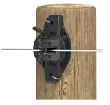 Gallagher Black electric fence insulator attached to a wooden post with a white background