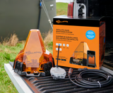 Gallagher / Gasbot Satellite Liquid Monitoring System on a truck tailgate next to water tank