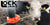 Electric Fence with black and white cows next to fence wire and orange lock jaw insulator